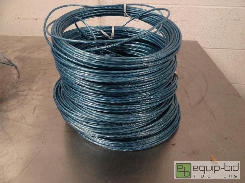 lot 1279 image: Very Large Spool of Plastic Coating Anchor Wire