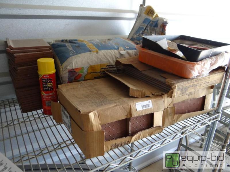 lot 107 image: Lot of new tile and grout....