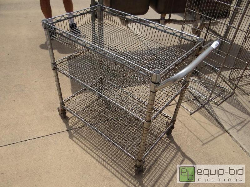 lot 139 image: 3 shelf bus cart with wheels....