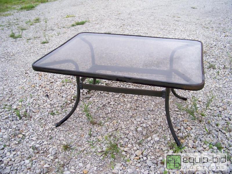 lot 1005 image: Glass top Patio Table
