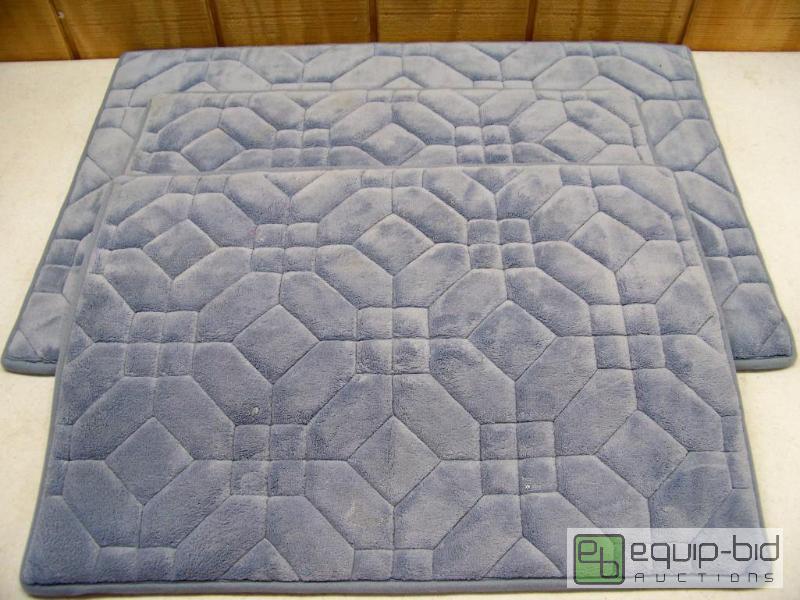 lot 1044 image: 3 Blue Memory Foam Bath Rugs