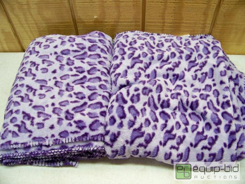 lot 1053 image: 2 Purple Cheetah Throws