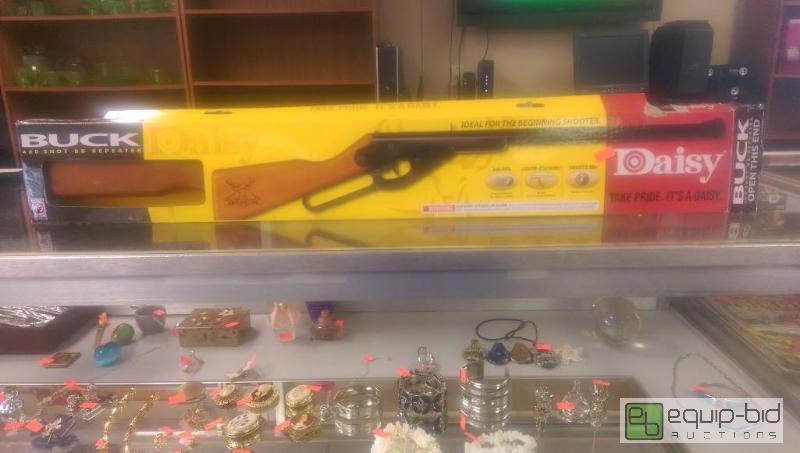 lot 216 image: Daisy Buck BB Gun...