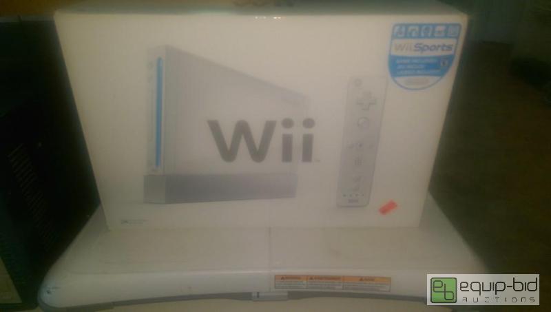lot 63 image: Like New Wii with controllers in excellent wo...