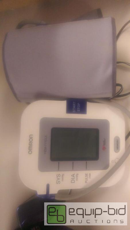 lot 65 image: Blood Pressure Monitor and Ankle Weights...