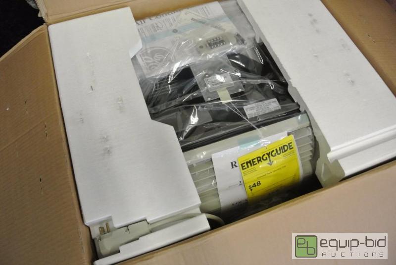 lot 1034 image: GE New in Box Air Conditioner with Remote