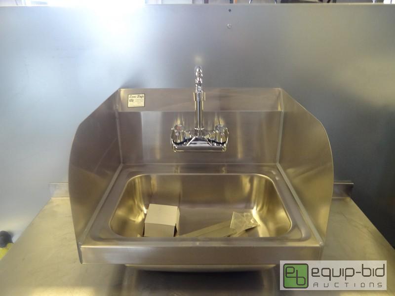 lot 1659 image: New Stainless Hand Sink With Side Splash Guards