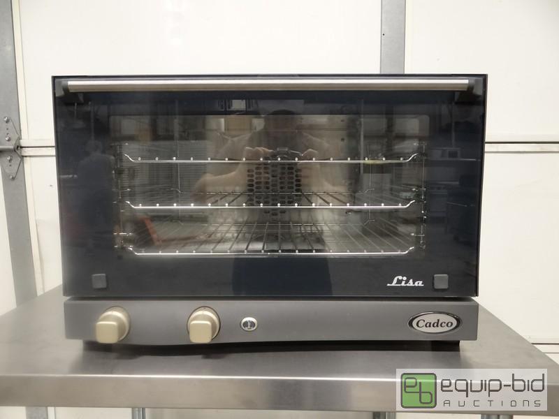 lot 735 image: New Cadco Half Size Convection Oven