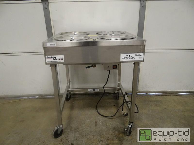 lot 747 image: Belshaw 4 Well Donut Icing Table