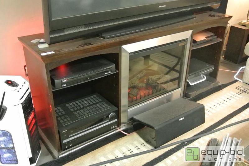 lot 721 image: Very Cool Entertainment Center with Built in Remote Controlled Electric Fireplace