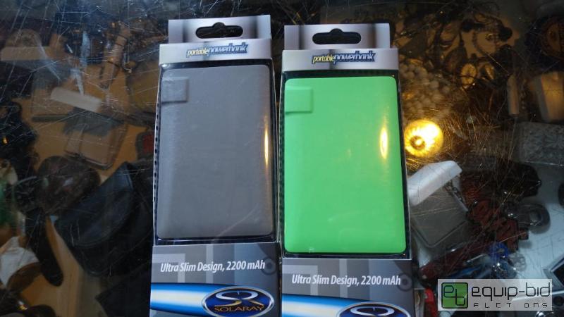 lot 534 image: (2) Portable Phone Charging Batteries