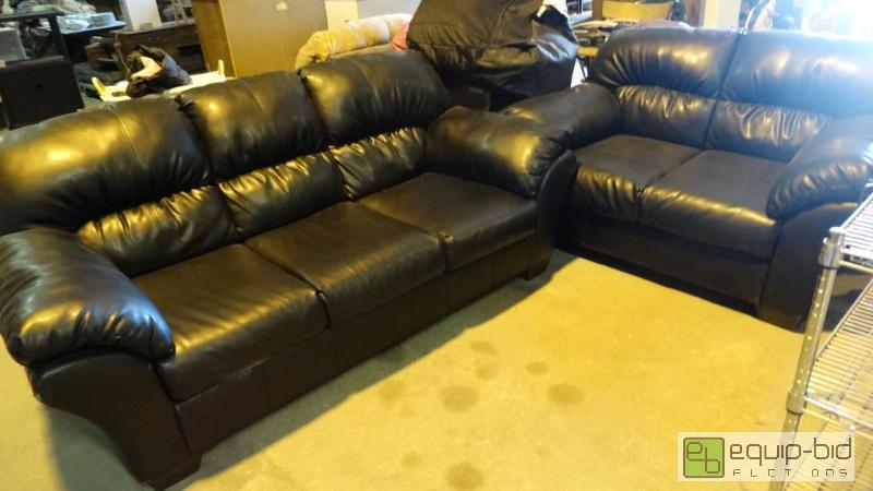 lot 621 image: Pleather Dark Couch And Love Seat Set