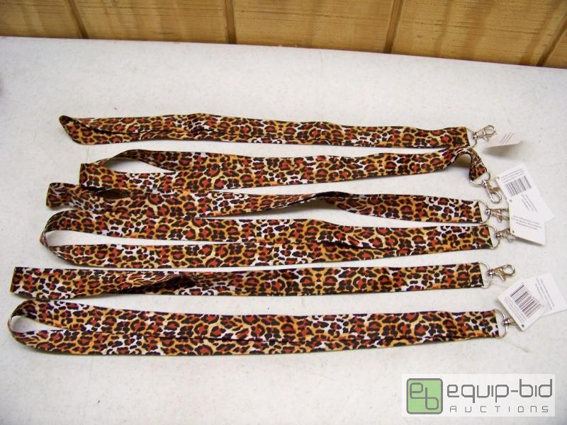 lot 1012 image: 6 New Leopard Lanyards