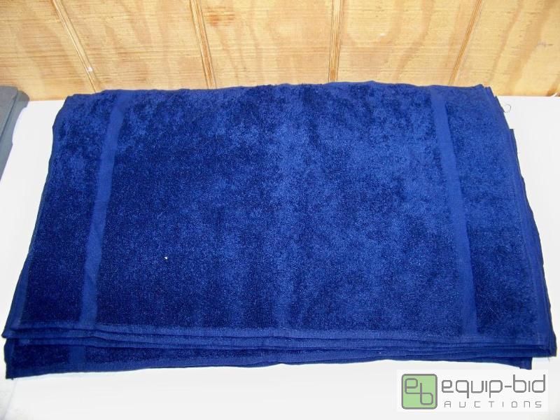 lot 1121 image: 12 New Navy Blue Hand Towels Joseph Garfland Junior Soaker