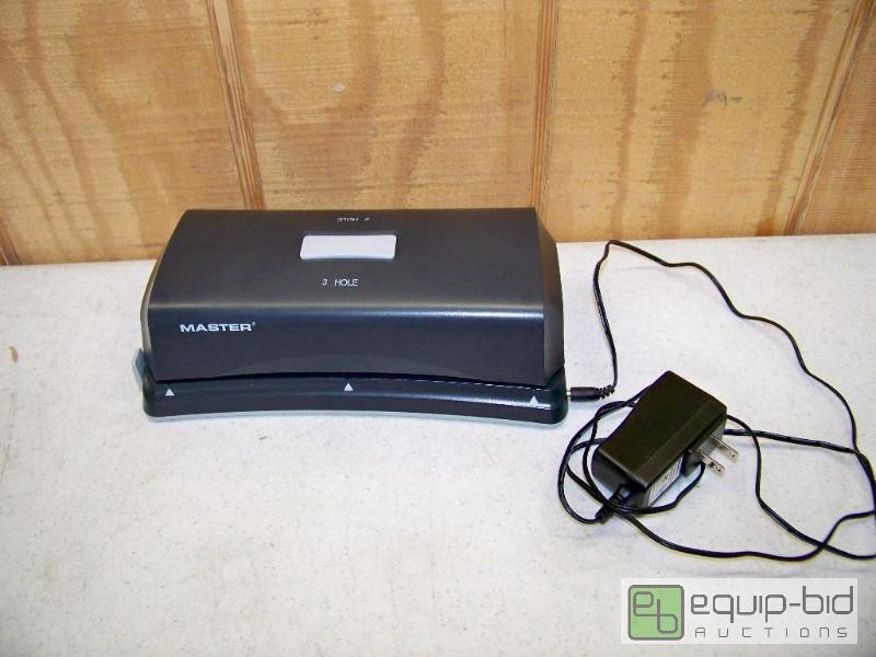 lot 1242 image: Master Electric Hole Punch