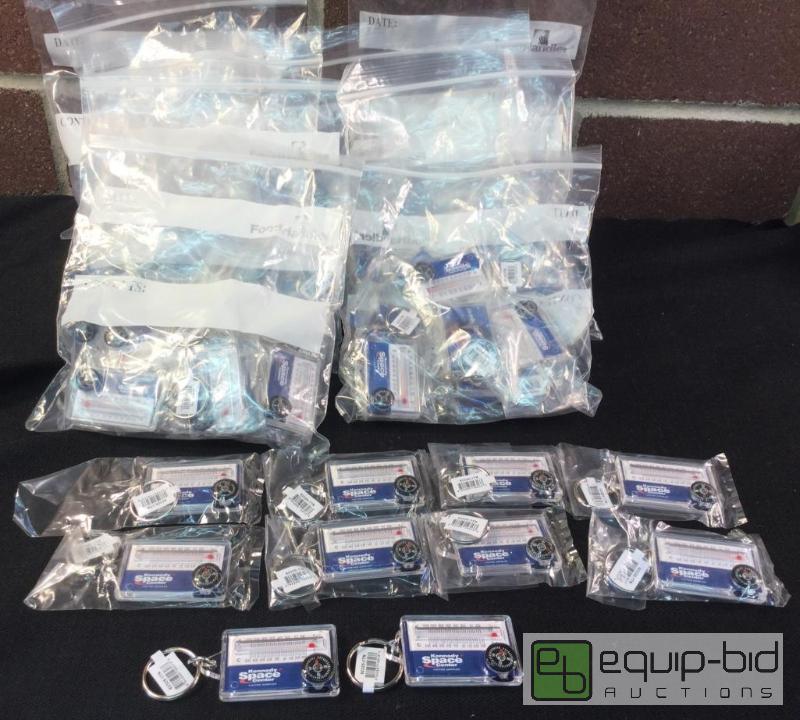 lot 3119 image: Lot of NASA Keychains w Compass and Thermometer