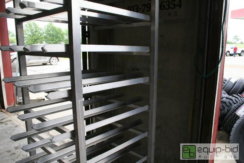 lot 1425 image: # 10 can rack 6ft tall 25in wide 36in deep...