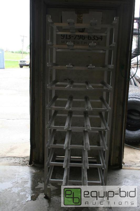lot 1426 image: # 10 can rack 6ft tall 25in wide 36in deep...