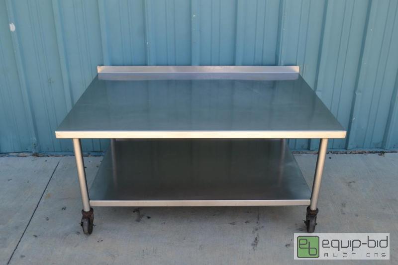 lot 35 image: Equipment Stand56 Inches Wide by 38 Inches De...