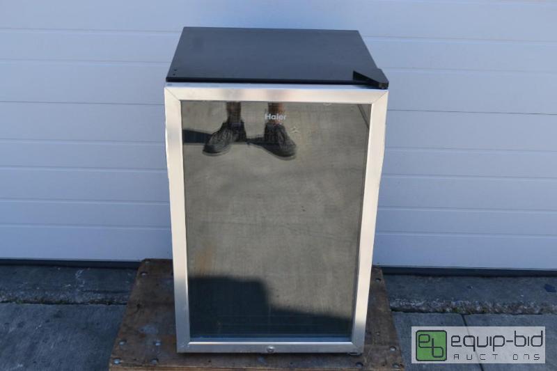 lot 46 image: Haier Countertop Glass Door CoolerModel #HBCN...