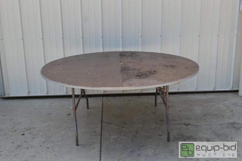 lot 81 image: 6 Foot Round Wood Table on Metal Folding Legs...