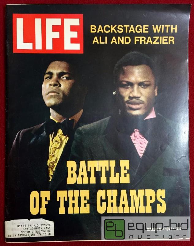 lot 1025 image: MUHAMMAD ALI & JOE FRAZIER 1971 LIFE MAGAZINE MARCH 5 AMAZING CONDITION