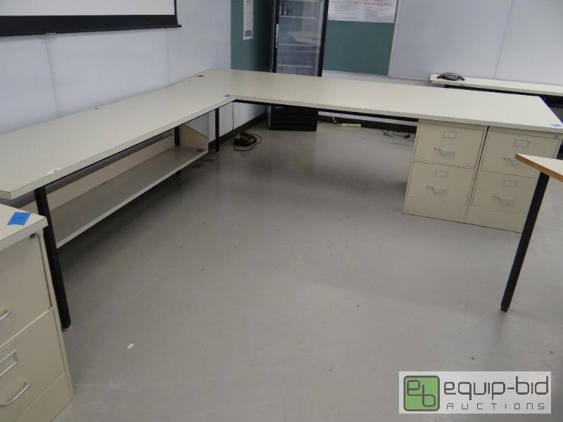 lot 103 image: Large L shape desk with slant top on one side...