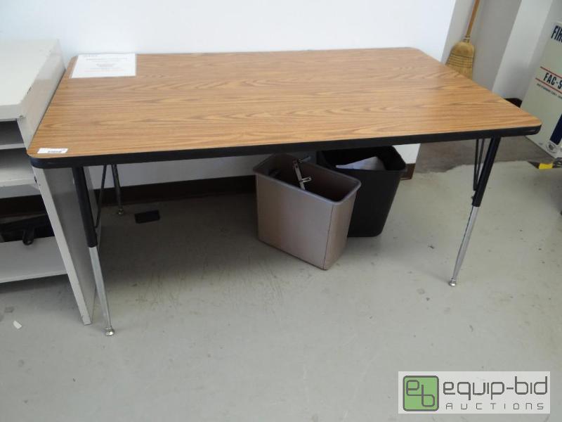 lot 106 image: 5 ft office table with adjustable legs....