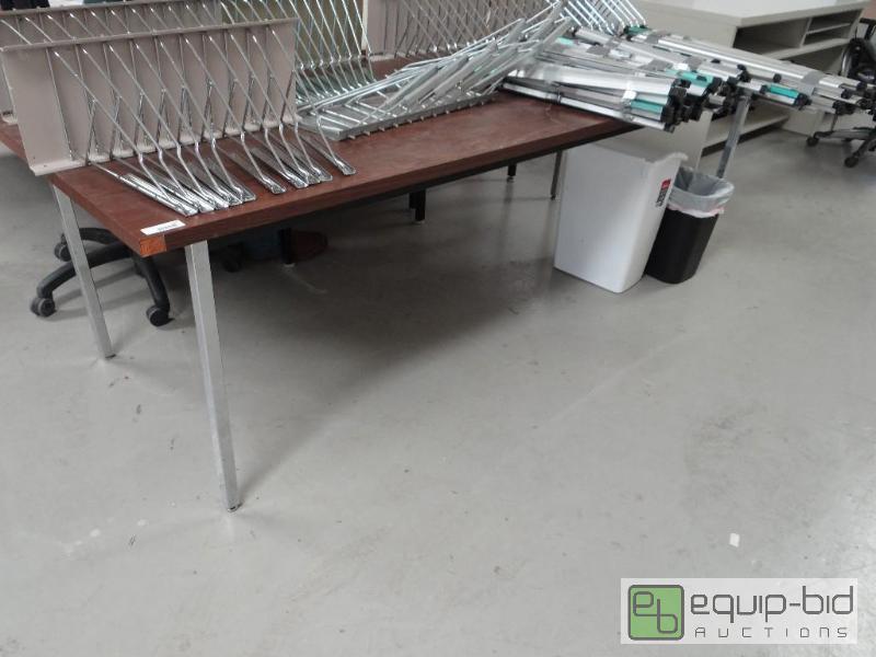 lot 121 image: Approx. 8ft work table with metal legs....