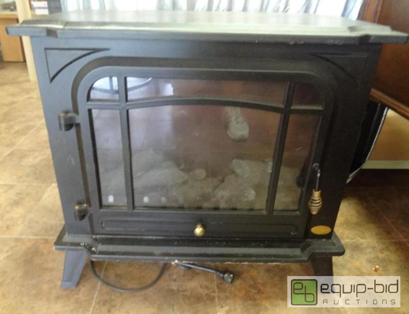 lot 13 image: Electric Heater Cast Iron Look without the we...