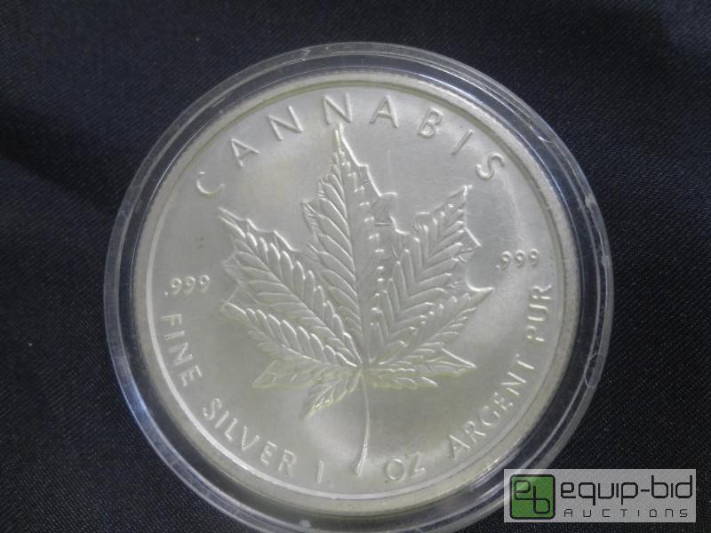 lot 337 image: Cannibis Sterling Silver Coin...