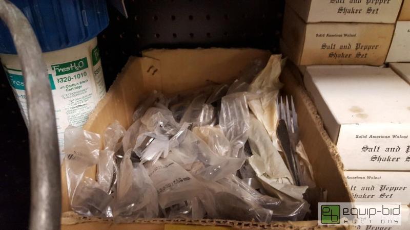 lot 1058 image: Box of silverware and water filter...