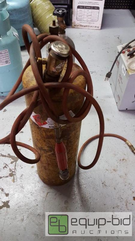 lot 1100 image: Acetylene tank...