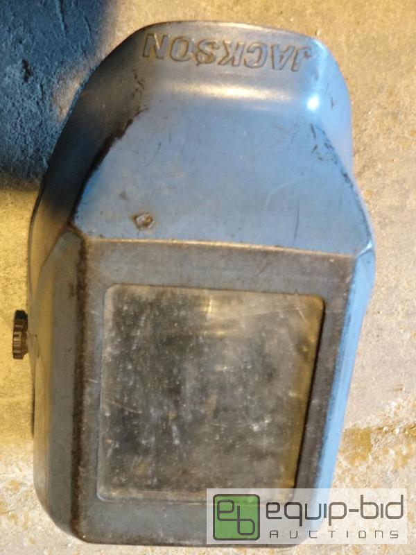 lot 557 image: Welding Mask w Craftsman Belt Sander