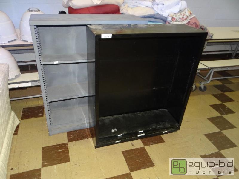 lot 1254 image: Lot of 2 metal book shelves....