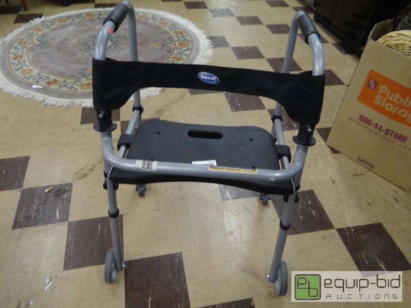 lot 1275 image: Walker with seat....