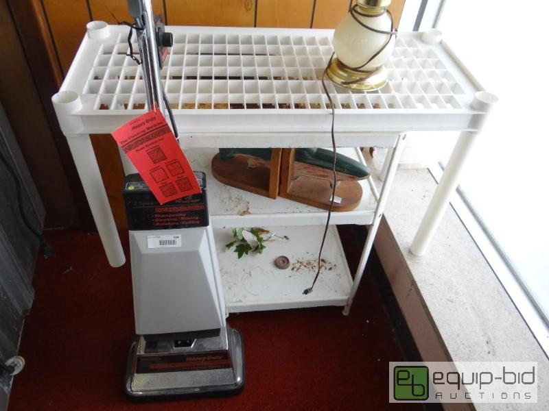 lot 424 image: Metal shelf, book ends, lamp, carpet cleaner....