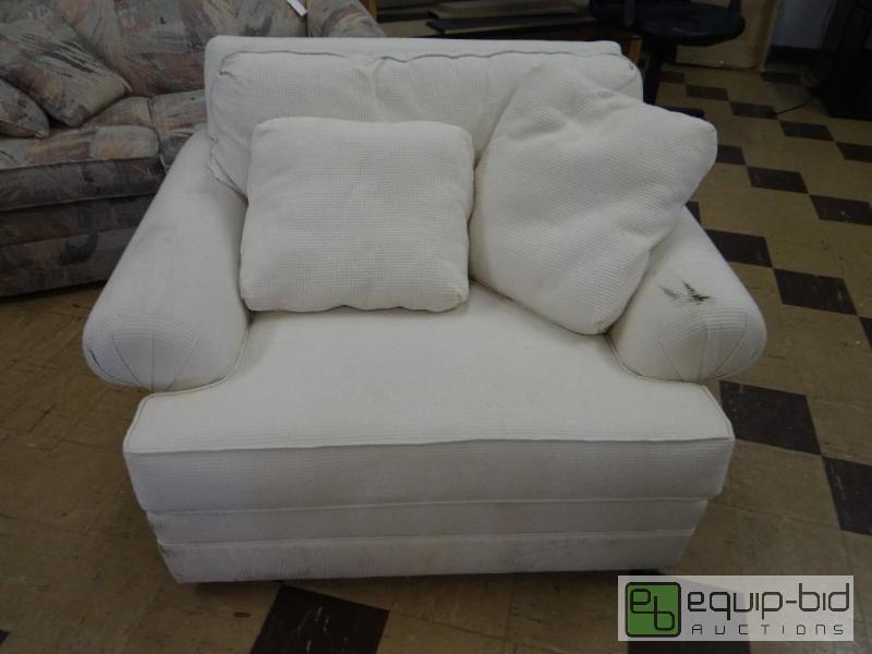 lot 443 image: Oversized white chair with pillows....