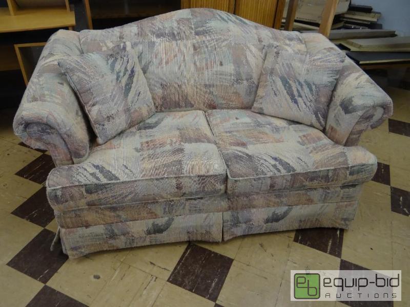 lot 444 image: Loveseat with pillows....