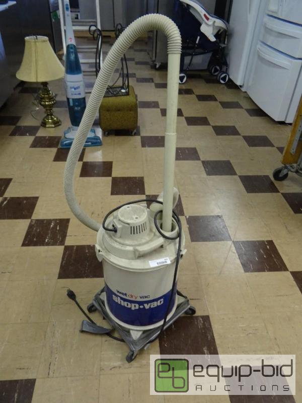 lot 466 image: Wetdry shop vac with hose....