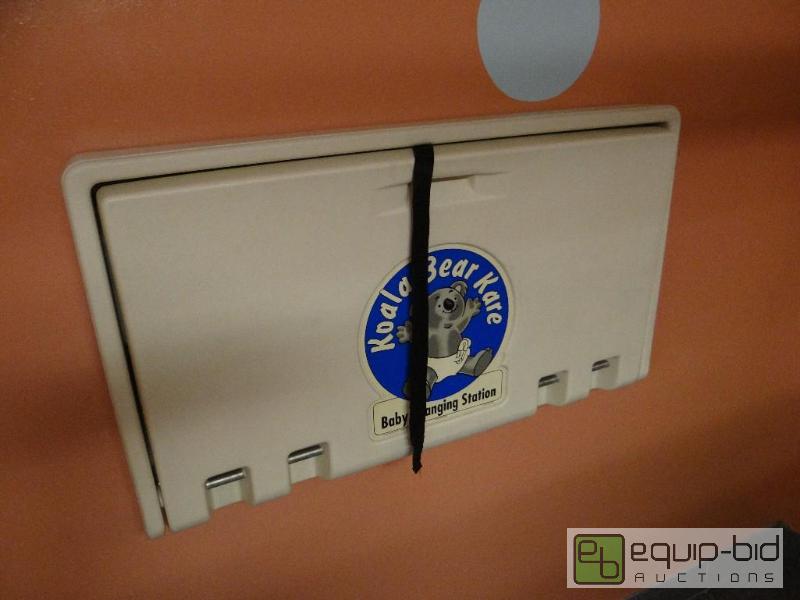 lot 1057 image: Wall Mounted Baby Changing Station