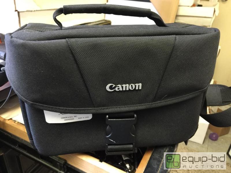 lot 100 image: New Canon camera bag...
