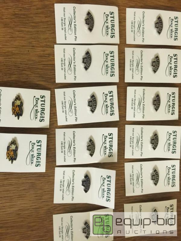 lot 25 image: A lot of 14 Sturgis bike rally pins...