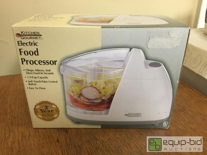 lot 31 image: Small easy and quick use food processor...