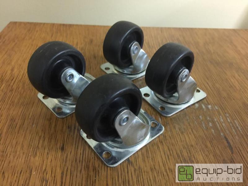 lot 34 image: Set of 2 inch casters...