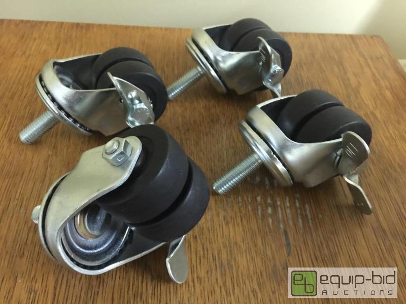 lot 40 image: Set of four heavy duty double 2 inch caster w...