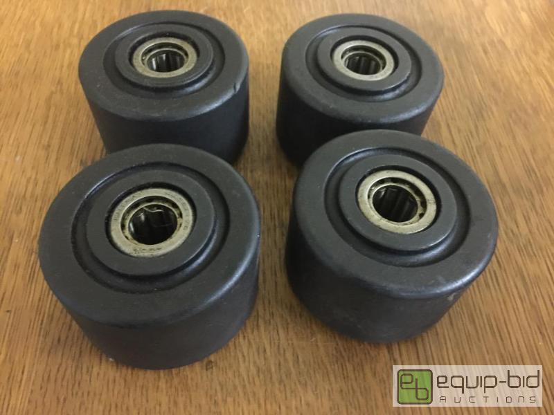 lot 41 image: Set of 2 inch wide 3 inch round wheels with p...