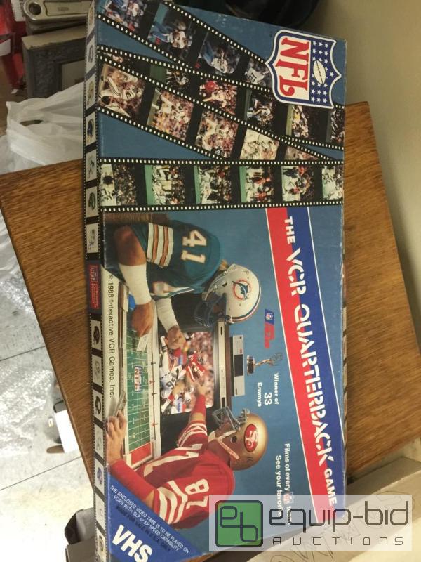 lot 43 image: Sports collectible old VCR quarterback game i...