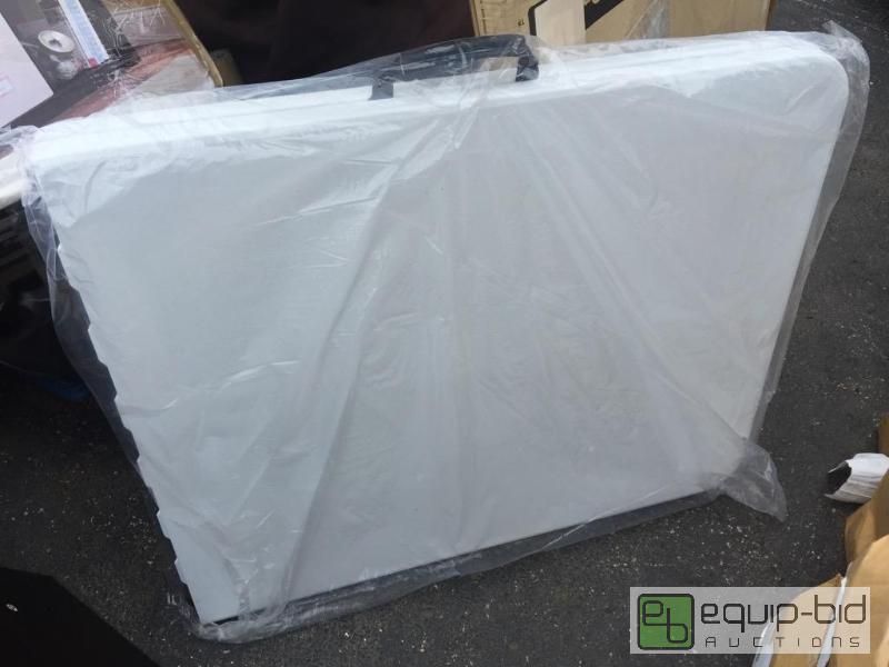 lot 88 image: New fold up six-foot banquet table with handl...