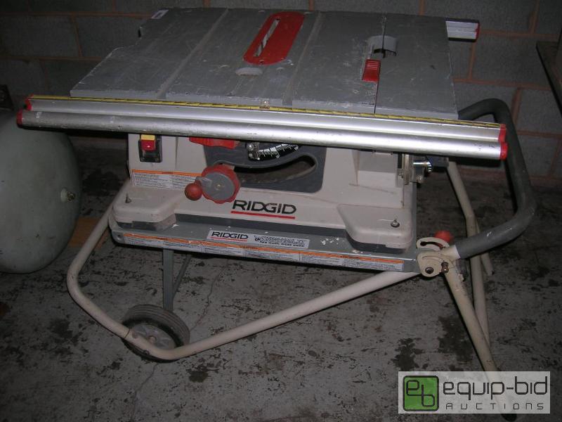 lot 3212 image: Ridgid Work-N-Haul-It 2 Wheel Work Stand Table Saw